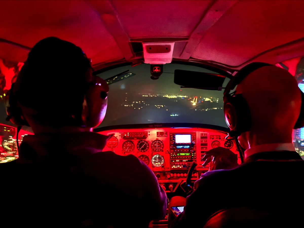 An instructor and Student making a night appraoch to Biggin Hill